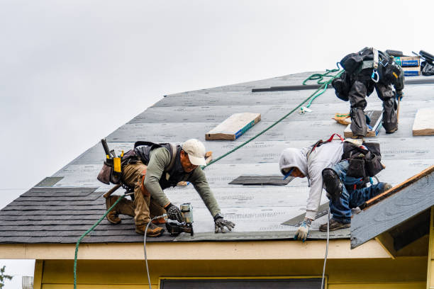 Professional Gutter Installation technician working in Saugus, MA